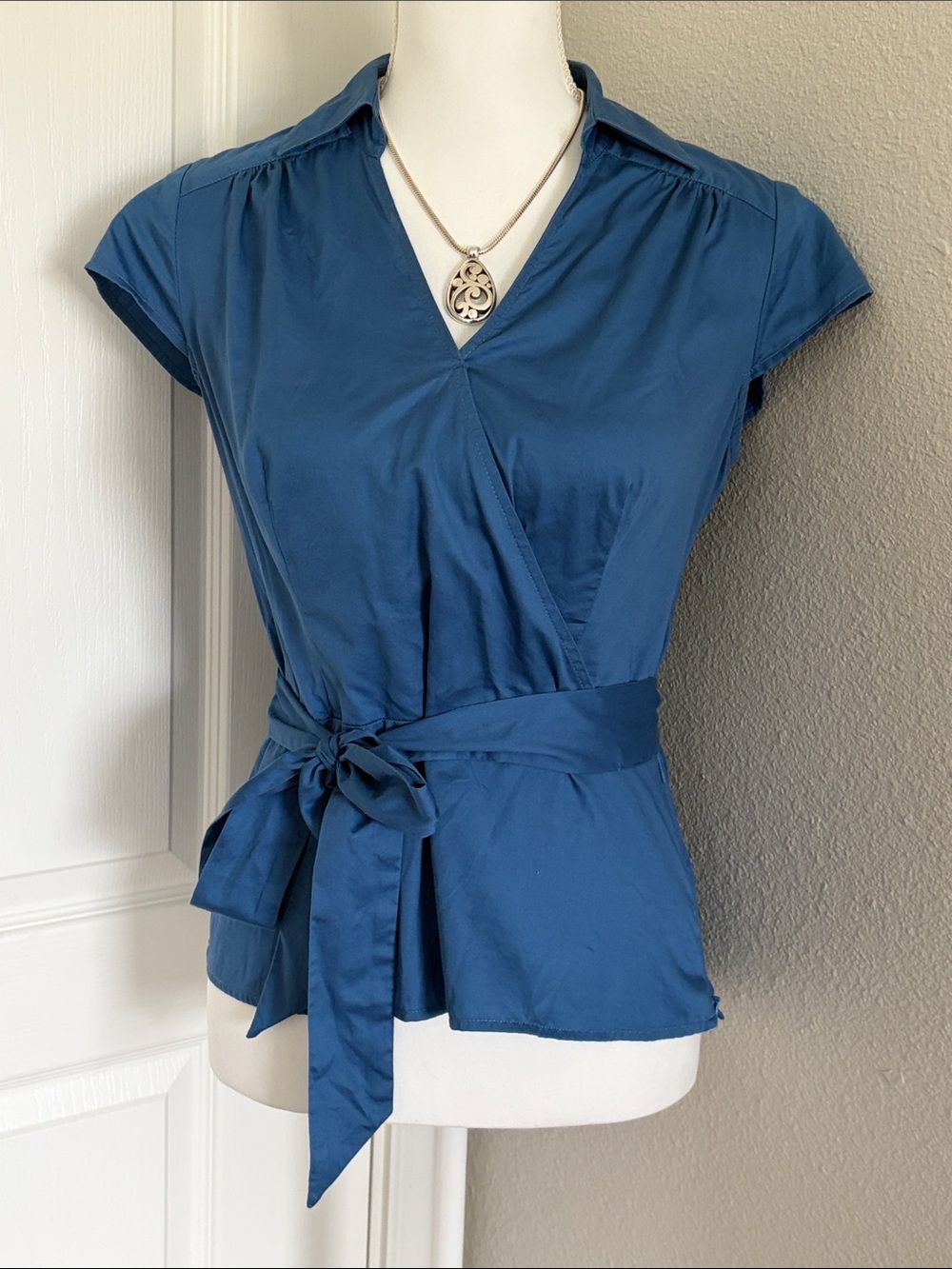 Loft Women's Wrap Waist Blouse in Teal Blue with side zipper